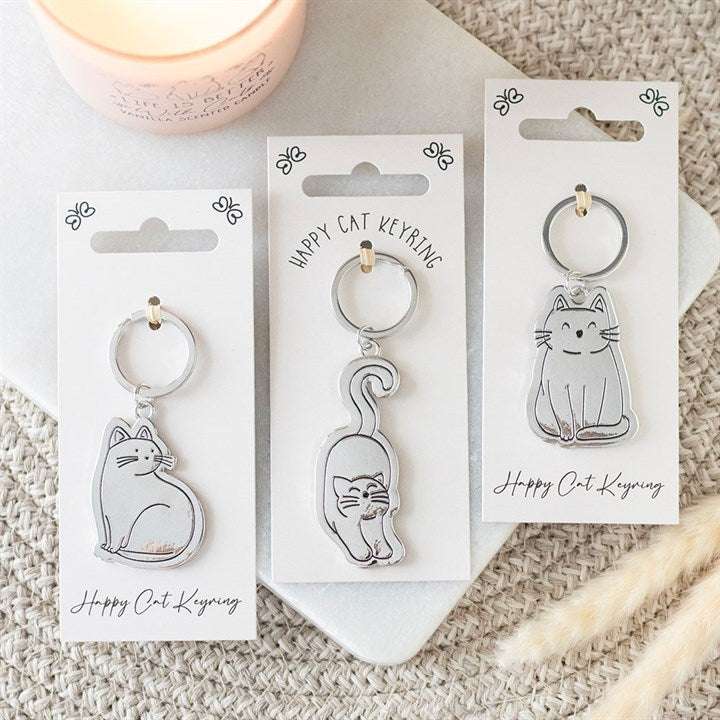 Set of 24 Happy Cat Keyrings on Display
