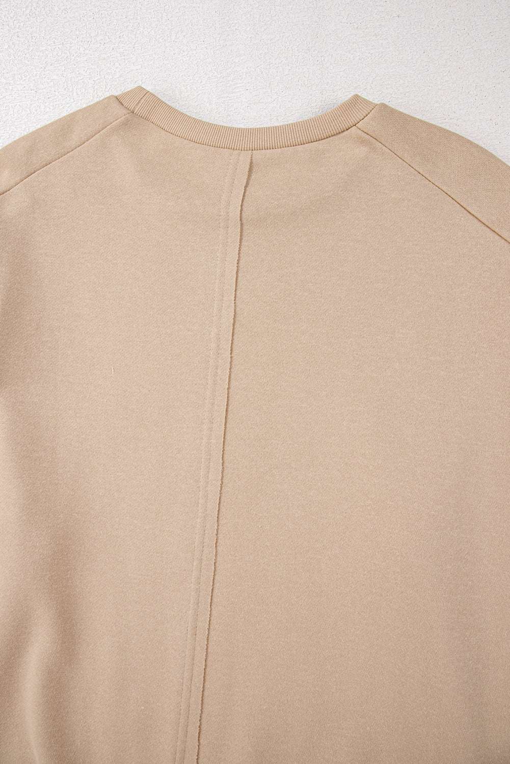 A pale khaki plus-size sweatshirt featuring a floral peace sign graphic and a Washed Terry Finish